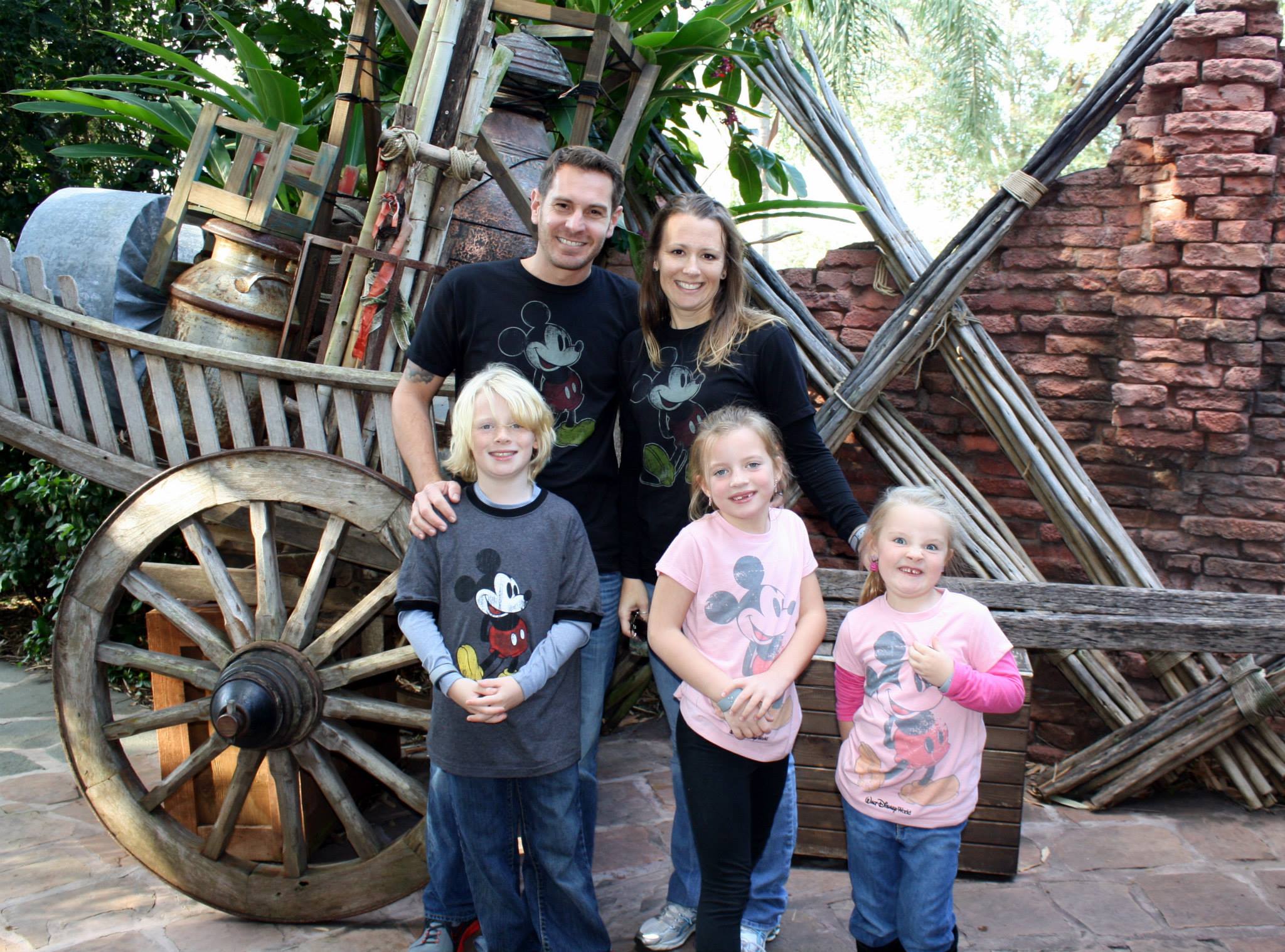 Family in matching Mickey shirts